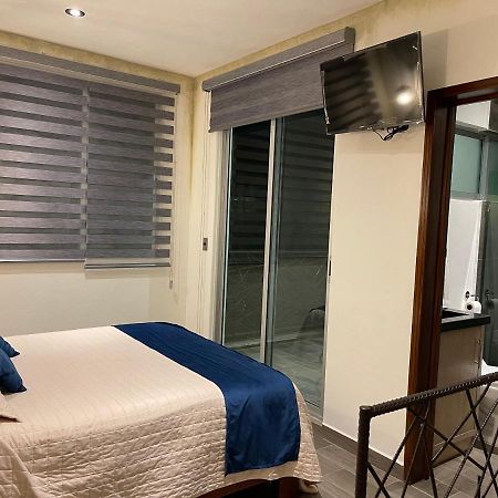 Bellhouse Hotel Бернал Екстериор снимка