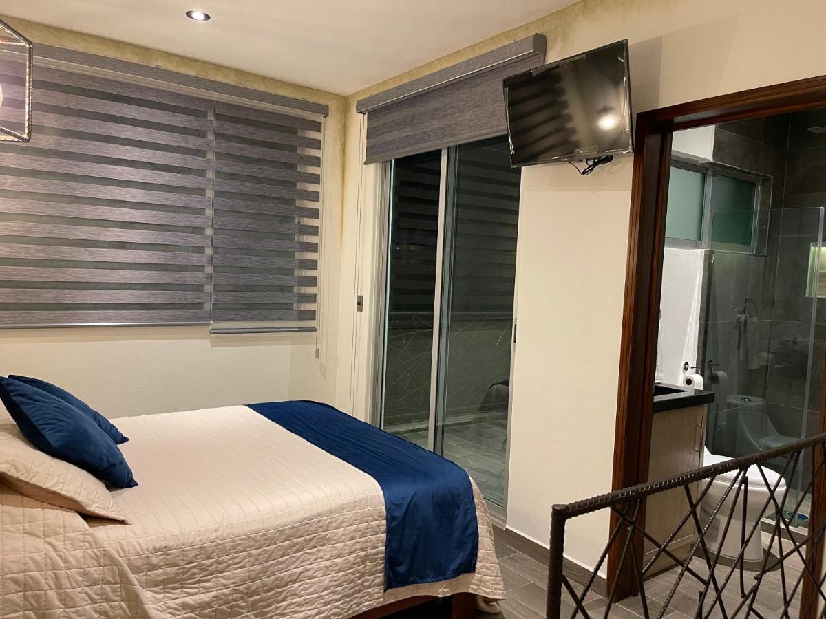 Bellhouse Hotel Бернал Екстериор снимка